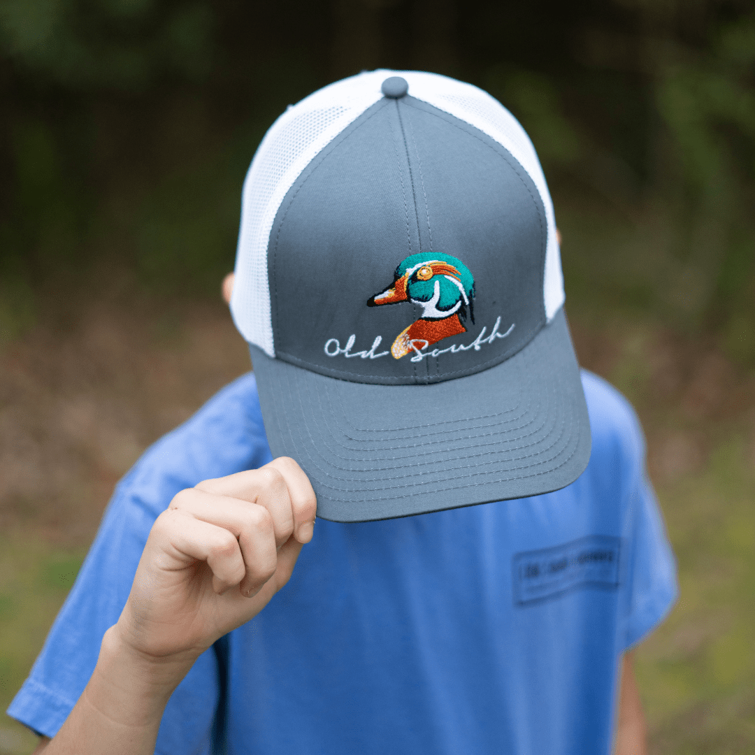 http://www.oldsouthapparel.com/cdn/shop/products/oldsouthapparel-wood-duck-trucker-hat-youth-439806.png?v=1700112960